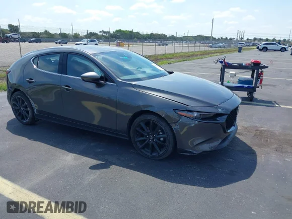 ✅ 2021 Mazda 3 Premium • VIN: JM1BPAML3M1311226 • Lot: 44709798. Listed on IAAI with 41,786 mi. Free auction sales archive from the USA and detailed vehicle history report at DreamBid. Image 1.