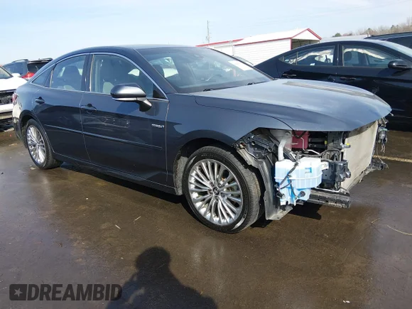 ✅ 2020 Toyota Avalon Limited Hybrid • VIN: 4T1D21FB6LU016044 • Лот: 44498551. Опубликован ранее на IAAI с пробегом 103 854 миль. Бесплатный доступ к архиву аукционных продаж из США и подробный отчёт об истории автомобиля на DreamBid. Изображение 1.