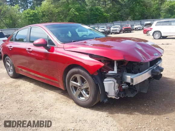 ✅ 2021 Kia K5 LXS • VIN: 5XXG14J25MG017996 • Лот: 42012573. Опубліковано раніше на IAAI з пробігом 87 583 миль. Безкоштовний доступ до архіву аукціонних продажів зі США та докладний звіт про історію автомобіля на DreamBid. Зображення 1.