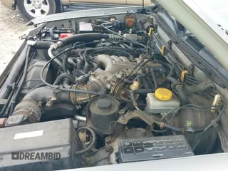 ✅ 1999 Nissan Pathfinder XE • VIN: JN8AR07S4XW360725 • Lot: 42124312. Listed on IAAI with 246,016 mi. Free auction sales archive from the USA and detailed vehicle history report at DreamBid. Image 20.