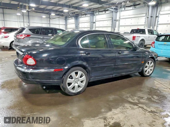 ✅ 2005 Jaguar X-Type 3.0L • VIN: SAJWA51C65WE24191 • Лот: 45637626. Опубликован ранее на Copart с пробегом 75 934 миль. Бесплатный доступ к архиву аукционных продаж из США и подробный отчёт об истории автомобиля на DreamBid. Изображение 3.