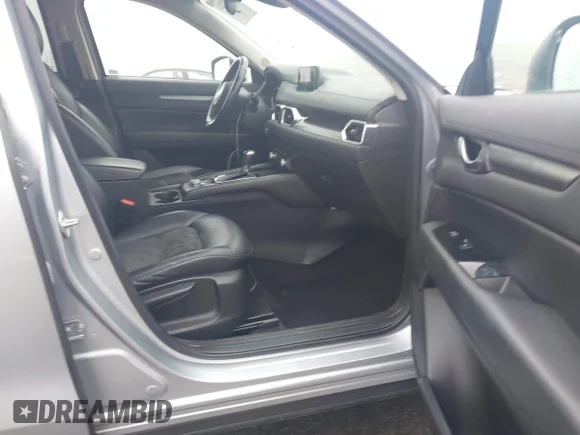 ✅ 2019 Mazda CX-5 Touring • VIN: JM3KFBCM1K0543711 • Lot: 44212224. Listed on IAAI with 101,132 mi. Free auction sales archive from the USA and detailed vehicle history report at DreamBid. Image 5.