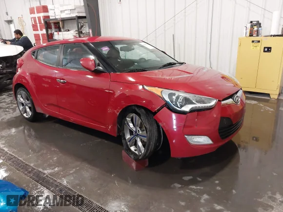 ✅ 2015 Hyundai Veloster • VIN: KMHTC6AD4FU222238 • Lot: 44595378. Listed on IAAI with 141,356 mi. Free auction sales archive from the USA and detailed vehicle history report at DreamBid. Image 1.