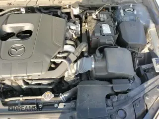 ✅ 2024 Mazda 3 S Carbon Edition • VIN: 3MZBPBCMXRM417700 • Lot: 81881145. Listed on Copart with 17,506 mi. Free auction sales archive from the USA and detailed vehicle history report at DreamBid. Image 15.