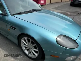 ✅ 2001 Aston Martin Vantage • VIN: SCFAB42321K402008 • Лот: 59334855. Опубликован ранее на Copart с пробегом 60 444 миль. Бесплатный доступ к архиву аукционных продаж из США и подробный отчёт об истории автомобиля на DreamBid. Изображение 11.