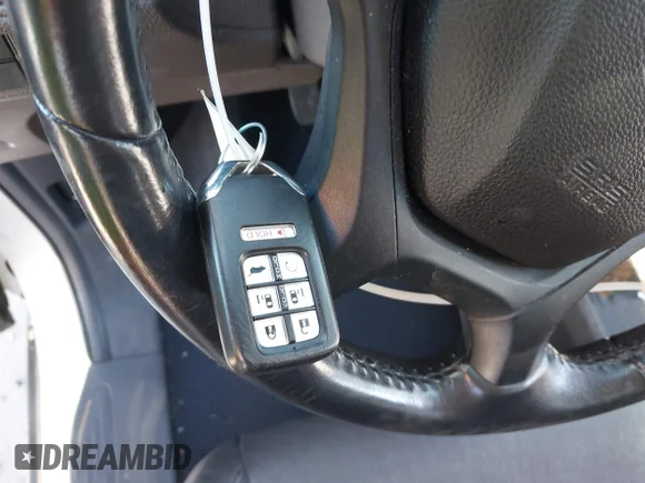 ✅ 2018 Honda Odyssey EX-L • VIN: 5FNRL6H7XJB006510 • Lot: 45294219. Listed on IAAI with 83,080 mi. Free auction sales archive from the USA and detailed vehicle history report at DreamBid. Image 11.