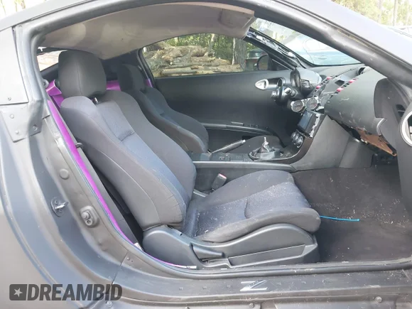 ✅ 2003 Nissan 350Z Touring • VIN: JN1AZ34D43T119815 • Lot: 43352336. Wystawiony na IAAI z przebiegiem Nie podano. Bezpłatny archiwum sprzedaży aukcyjnych z USA i szczegółowy raport historii pojazdu na DreamBid. Zdjęcie 5.