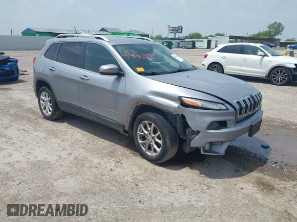 ✅ 2014 Jeep Cherokee Latitude • VIN: 1C4PJLCSXEW105661 • Lot: 44963680. Listed on IAAI with 197,353 mi. Free auction sales archive from the USA and detailed vehicle history report at DreamBid. Image 1.
