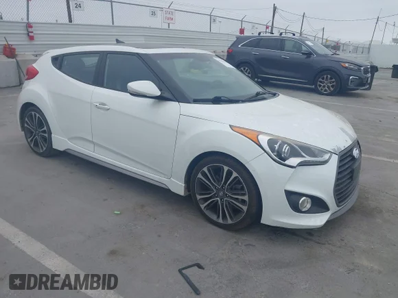 ✅ 2016 Hyundai Veloster Turbo • VIN: KMHTC6AEXGU269817 • Lot: 45366004. Listed on IAAI with 88,289 mi. Free auction sales archive from the USA and detailed vehicle history report at DreamBid. Image 1.