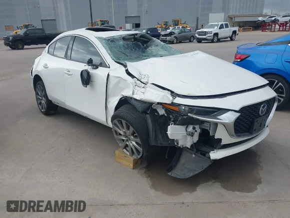 ✅ 2022 Mazda 3 Premium • VIN: 3MZBPADL2NM314510 • Лот: 44520790. Опубликован ранее на IAAI с пробегом 63 177 миль. Бесплатный доступ к архиву аукционных продаж из США и подробный отчёт об истории автомобиля на DreamBid. Изображение 1.