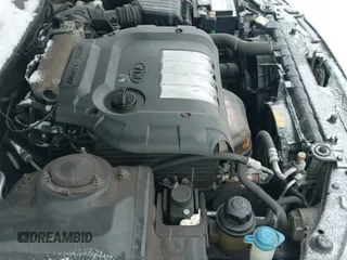 ✅ 2001 Kia Optima LX • VIN: KNAGD126515030011 • Lot: 41256362. Wystawiony na IAAI z przebiegiem 94 677 mil. Bezpłatny archiwum sprzedaży aukcyjnych z USA i szczegółowy raport historii pojazdu na DreamBid. Zdjęcie 18.