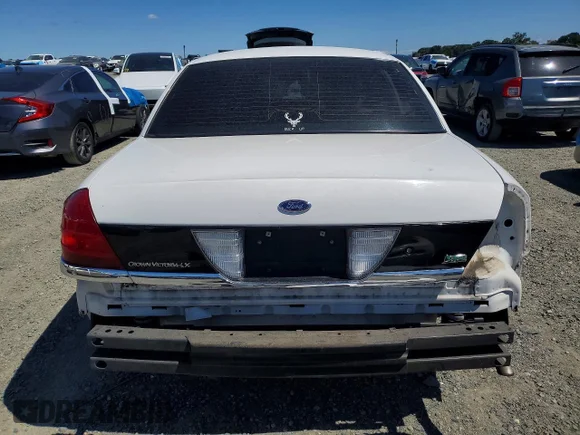 ✅ 2011 Ford Crown Victoria LX • VIN: 2FABP7EV1BX127139 • Lot: 56540846. Wystawiony na Copart z przebiegiem 98 764 mil. Bezpłatny archiwum sprzedaży aukcyjnych z USA i szczegółowy raport historii pojazdu na DreamBid. Zdjęcie 6.