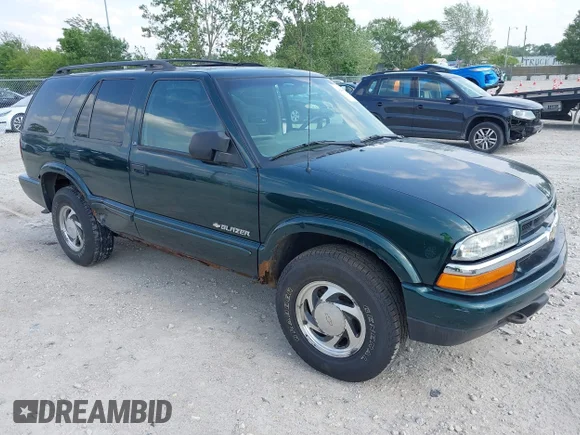 ✅ 2002 Chevrolet Blazer LS • VIN: 1GNDT13W12K157145 • Лот: 42446260. Опубликован ранее на IAAI с пробегом 182 713 миль. Бесплатный доступ к архиву аукционных продаж из США и подробный отчёт об истории автомобиля на DreamBid. Изображение 1.