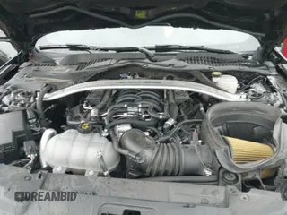 ✅ 2023 Ford Mustang Mach 1 • VIN: 1FA6P8R04P5499976 • Lot: 40755103. Listed on IAAI with 16,104 mi. Free auction sales archive from the USA and detailed vehicle history report at DreamBid. Image 19.