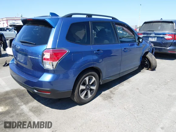 ✅ 2018 Subaru Forester Premium • VIN: JF2SJAGC4JH566811 • Lot: 45040048. Listed on IAAI with 29,173 mi. Free auction sales archive from the USA and detailed vehicle history report at DreamBid. Image 4.