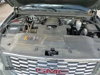 ✅ 2018 GMC Yukon Denali • VIN: 1GKS1CKJXJR107782 • Lot: 61077125. Listed on Copart with 90,015 mi. Free auction sales archive from the USA and detailed vehicle history report at DreamBid. Image 14.