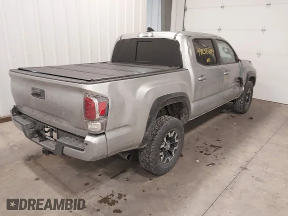 ✅ 2022 Toyota Tacoma TRD Off Road • VIN: 3TMCZ5AN8NM477502 • Lot: 44232644. Wystawiony na IAAI z przebiegiem 65 753 mil. Bezpłatny archiwum sprzedaży aukcyjnych z USA i szczegółowy raport historii pojazdu na DreamBid. Zdjęcie 4.