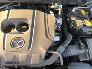 ✅ 2024 Mazda 3 S Carbon Edition • VIN: JM1BPBLM7R1719851 • Лот: 87481395. Опубликован ранее на Copart с пробегом 4 749 миль. Бесплатный доступ к архиву аукционных продаж из США и подробный отчёт об истории автомобиля на DreamBid. Изображение 15.