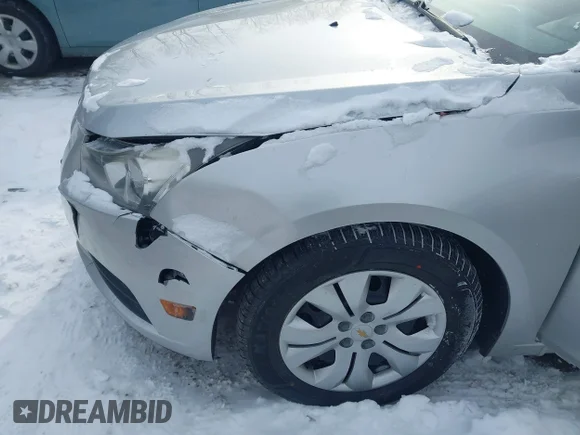 ✅ 2013 Chevrolet Cruze LS • VIN: 1G1PA5SH4D7140165 • Lot: 44334436. Listed on IAAI with 142,483 mi. Free auction sales archive from the USA and detailed vehicle history report at DreamBid. Image 6.