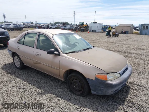 ✅ 1998 Ford Escort SE • VIN: 1FAFP13P9WW291761 • Lot: 45390001. Listed on IAAI with 157,469 mi. Free auction sales archive from the USA and detailed vehicle history report at DreamBid. Image 1.