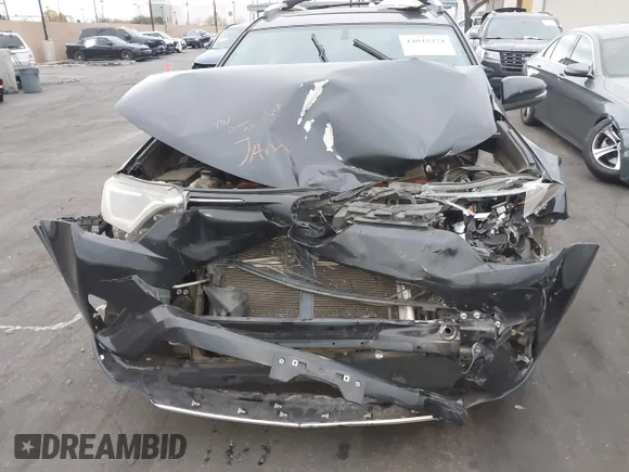 ✅ 2016 Toyota RAV4 XLE • VIN: JTMRJREVXGD053644 • Lot: 44045374. Listed on IAAI with 180,853 mi. Free auction sales archive from the USA and detailed vehicle history report at DreamBid. Image 6.