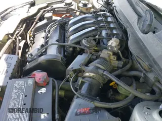 ✅ 2002 Ford Taurus SEL Deluxe • VIN: 1FAHP56S12A140906 • Lot: 42753878. Listed on IAAI with 153,917 mi. Free auction sales archive from the USA and detailed vehicle history report at DreamBid. Image 14.