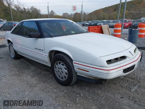 ✅ 1992 Pontiac Grand Prix • VIN: 1G2WJ14T3NF281737 • Lot: 43491050. Listed on IAAI with 176,784 mi. Free auction sales archive from the USA and detailed vehicle history report at DreamBid. Image 1.