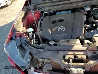 ✅ 2021 Mazda CX-5 Grand Touring • VIN: JM3KFADM9M0403935 • Лот: 90327955. Опубликован ранее на Copart с пробегом 56 664 миль. Бесплатный доступ к архиву аукционных продаж из США и подробный отчёт об истории автомобиля на DreamBid. Изображение 16.