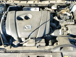 ✅ 2016 Mazda CX-5 Grand Touring • VIN: JM3KE2DY6G0769349 • Lot: 43593752. Wystawiony na IAAI z przebiegiem 80 588 mil. Bezpłatny archiwum sprzedaży aukcyjnych z USA i szczegółowy raport historii pojazdu na DreamBid. Zdjęcie 19.