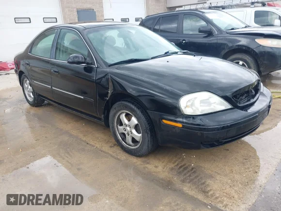 ✅ 2002 Mercury Sable GS • VIN: 1MEFM50U32G634927 • Lot: 44985380. Listed on IAAI with 151,917 mi. Free auction sales archive from the USA and detailed vehicle history report at DreamBid. Image 1.