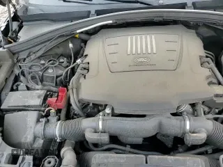 ✅ 2018 Land Rover Range Rover Velar R-Dynamic HSE • VIN: SALYM2RV8JA742507 • Lot: 67395445. Listed on Copart with 99,589 mi. Free auction sales archive from the USA and detailed vehicle history report at DreamBid. Image 16.