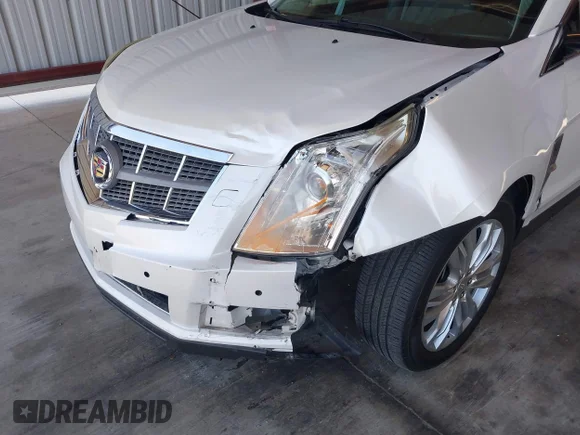 ✅ 2011 Cadillac SRX Performance Collection • VIN: 3GYFNEEY9BS533591 • Лот: 45259591. Опубліковано раніше на IAAI з пробігом 120 124 миль. Безкоштовний доступ до архіву аукціонних продажів зі США та докладний звіт про історію автомобіля на DreamBid. Зображення 6.