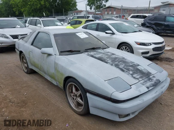 ✅ 1986 Toyota Supra • VIN: JT2MA70L5G0017154 • Лот: 42638118. Опубликован ранее на IAAI с пробегом 175 862 миль. Бесплатный доступ к архиву аукционных продаж из США и подробный отчёт об истории автомобиля на DreamBid. Изображение 1.