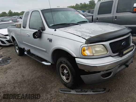 ✅ 2002 Ford F-150 XL • VIN: 1FTRX18L32NA51831 • Lot: 44976388. Listed on IAAI with 205,817 mi. Free auction sales archive from the USA and detailed vehicle history report at DreamBid. Image 1.
