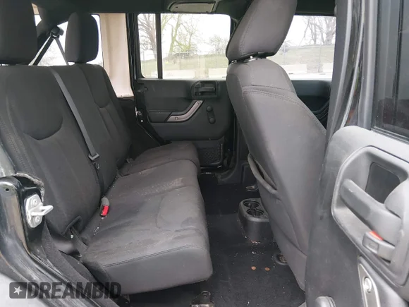 ✅ 2015 Jeep Wrangler Unlimited Sport • VIN: 1C4BJWDG3FL509684 • Lot: 44759707. Wystawiony na IAAI z przebiegiem 103 530 mil. Bezpłatny archiwum sprzedaży aukcyjnych z USA i szczegółowy raport historii pojazdu na DreamBid. Zdjęcie 8.
