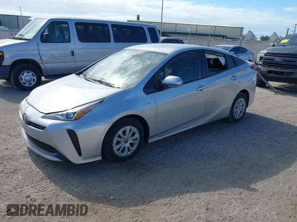 ✅ 2019 Toyota Prius L Eco • VIN: JTDKARFU3K3080884 • Lot: 43565189. Wystawiony na IAAI z przebiegiem 81 156 mil. Bezpłatny archiwum sprzedaży aukcyjnych z USA i szczegółowy raport historii pojazdu na DreamBid. Zdjęcie 2.