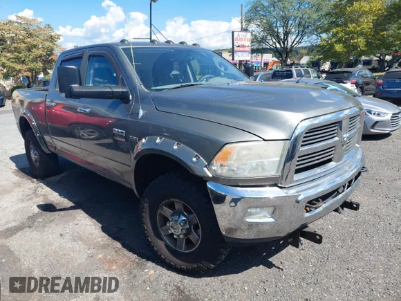 ✅ 2011 Ram 2500 ST • VIN: 3D7TT2CT1BG545716 • Lot: 71645165. Listed on Copart with 123,515 mi. Free auction sales archive from the USA and detailed vehicle history report at DreamBid. Image 1.