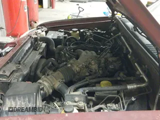 ✅ 2004 Nissan Frontier XE • VIN: 1N6ED27T54C480835 • Lot: 43628703. Listed on IAAI with 215,829 mi. Free auction sales archive from the USA and detailed vehicle history report at DreamBid. Image 12.