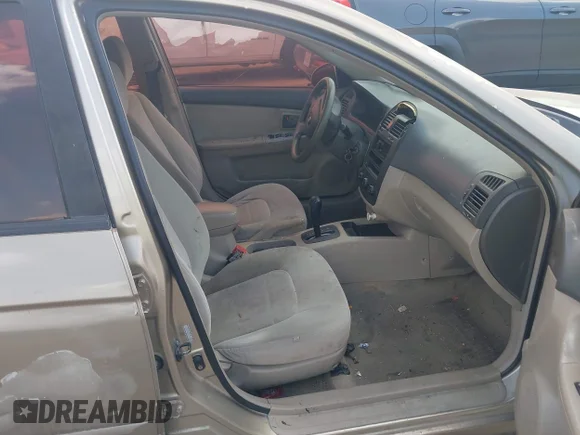 ✅ 2006 Kia Spectra EX • VIN: KNAFE121X65357038 • Лот: 43227593. Опубликован ранее на IAAI с пробегом 268 321 миль. Бесплатный доступ к архиву аукционных продаж из США и подробный отчёт об истории автомобиля на DreamBid. Изображение 5.