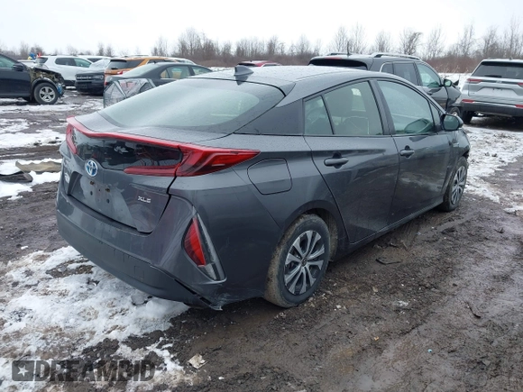 ✅ 2021 Toyota Prius XLE • VIN: JTDKAMFP1M3171605 • Lot: 44643710. Wystawiony na IAAI z przebiegiem 220 055 mil. Bezpłatny archiwum sprzedaży aukcyjnych z USA i szczegółowy raport historii pojazdu na DreamBid. Zdjęcie 4.