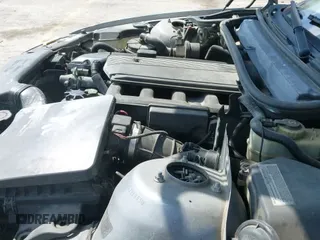 ✅ 2004 BMW 3 Series 325Ci • VIN: WBABW33454PL25129 • Lot: 42027355. Listed on IAAI with 124,681 mi. Free auction sales archive from the USA and detailed vehicle history report at DreamBid. Image 12.