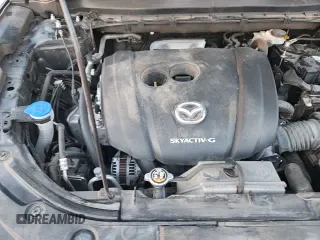 ✅ 2021 Mazda CX-5 Touring • VIN: JM3KFACMXM0462090 • Лот: 70245705. Опубликован ранее на Copart с пробегом 96 650 миль. Бесплатный доступ к архиву аукционных продаж из США и подробный отчёт об истории автомобиля на DreamBid. Изображение 16.