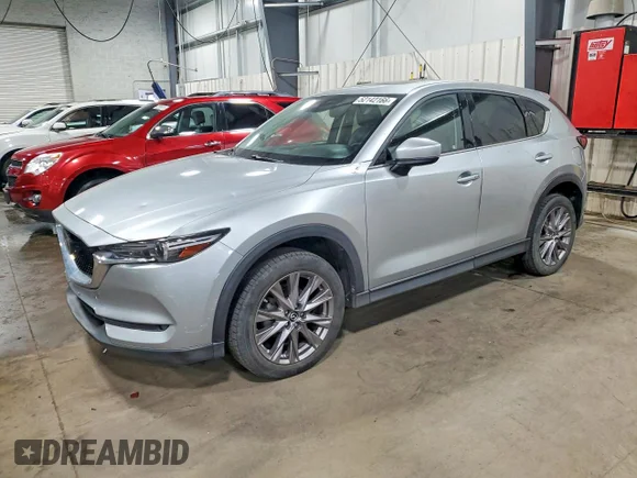 ✅ 2019 Mazda CX-5 Grand Touring • VIN: JM3KFBDMXK0610255 • Lot: 52142166. Listed on Copart with 115,388 mi. Free auction sales archive from the USA and detailed vehicle history report at DreamBid. Image 1.