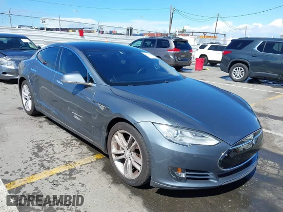 ✅ 2014 Tesla Model S 60 • VIN: 5YJSA1S15EFP29010 • Lot: 41798180. Listed on IAAI with 142,754 mi. Free auction sales archive from the USA and detailed vehicle history report at DreamBid. Image 1.