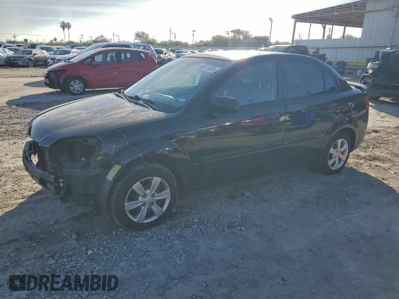 ✅ 2011 Kia Rio LX • VIN: KNADH4A39B6851639 • Lot: 96575265. Wystawiony na Copart z przebiegiem 96 787 mil. Bezpłatny archiwum sprzedaży aukcyjnych z USA i szczegółowy raport historii pojazdu na DreamBid. Zdjęcie 1.