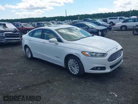 ✅ 2013 Ford Fusion SE Hybrid • VIN: 3FA6P0LU9DR204568 • Lot: 45579068. Wystawiony na IAAI z przebiegiem 153 823 mil. Bezpłatny archiwum sprzedaży aukcyjnych z USA i szczegółowy raport historii pojazdu na DreamBid. Zdjęcie 1.