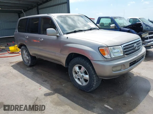 ✅ 2003 Toyota Land Cruiser • VIN: JTEHT05J332047202 • Лот: 42642004. Опубліковано раніше на IAAI з пробігом 282 640 миль. Безкоштовний доступ до архіву аукціонних продажів зі США та докладний звіт про історію автомобіля на DreamBid. Зображення 1.