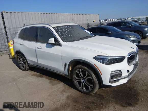 ✅ 2021 BMW X5 sDrive40i • VIN: 5UXCR4C01M9E56002 • Lot: 44780703. Listed on IAAI with 151,677 mi. Free auction sales archive from the USA and detailed vehicle history report at DreamBid. Image 1.