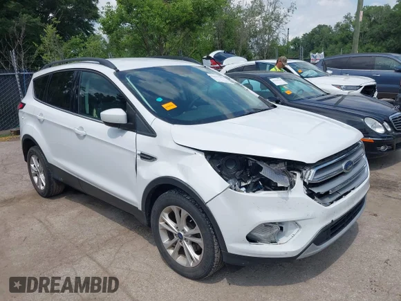 ✅ 2018 Ford Escape SE • VIN: 1FMCU0GD1JUB51199 • Lot: 45291197. Wystawiony na IAAI z przebiegiem 85 847 mil. Bezpłatny archiwum sprzedaży aukcyjnych z USA i szczegółowy raport historii pojazdu na DreamBid. Zdjęcie 1.