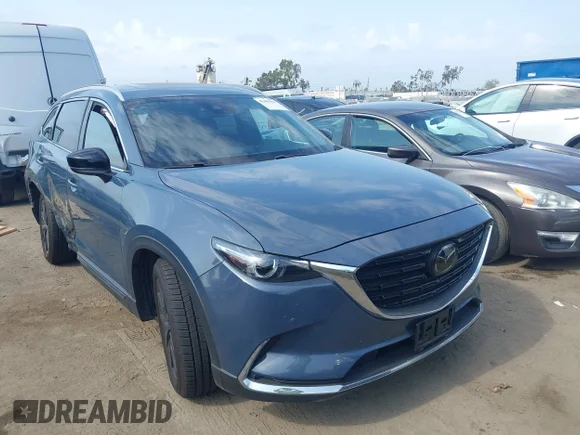 ✅ 2021 Mazda CX-9 Carbon Edition • VIN: JM3TCBDY0M0526352 • Лот: 42403901. Опубліковано раніше на IAAI з пробігом 50 193 миль. Безкоштовний доступ до архіву аукціонних продажів зі США та докладний звіт про історію автомобіля на DreamBid. Зображення 1.